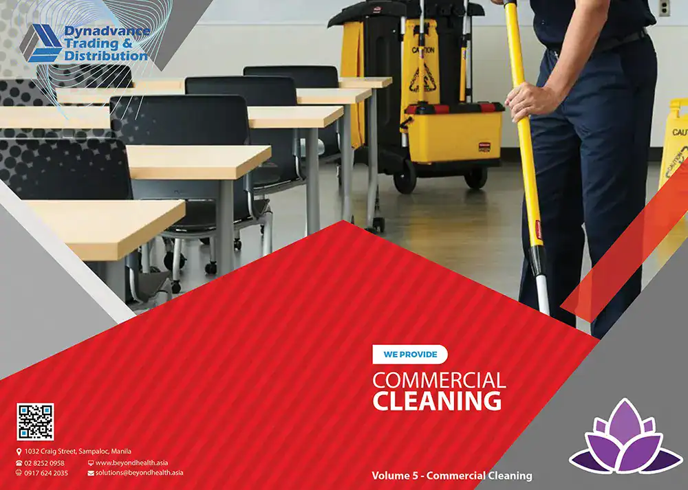Janitorial cleaning service in a classroom setting with a person mopping the floor.