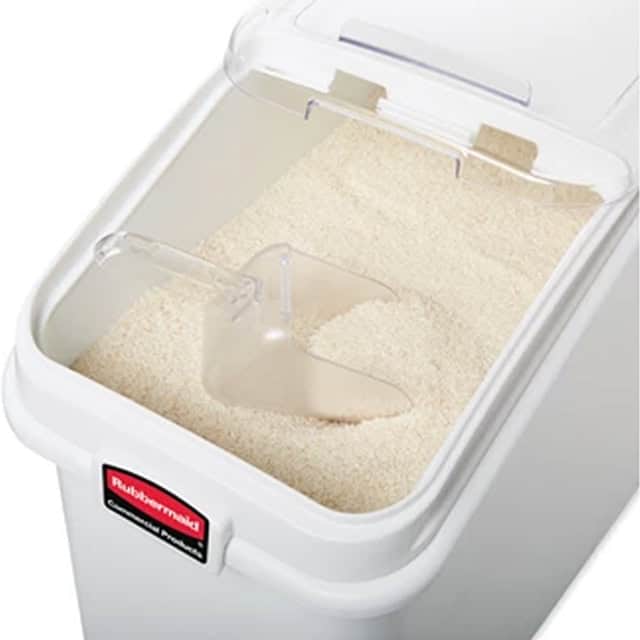 0030245_2.jpg Fine white rice in a rice cooker with a transparent lid, ready for cooking or serving. Perfect for preparing fresh rice for Asian cuisine and food service establishments.