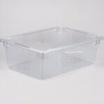 Rectangular clear plastic storage box with lid, durable and versatile food or organization container for home, office, or kitchen storage solutions.