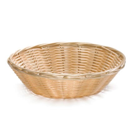 Woven bamboo basket for food storage and serving, eco-friendly and traditional Asian household item.