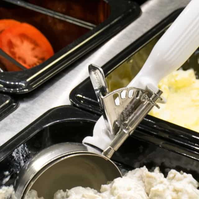 0055369_4.jpg Butter churner machine in ice cream or gelato production line, commercial kitchen setting - Beyond Hygiene Asia, professional food hygiene standards.