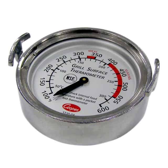 Thermometer for grilling and food safety in commercial kitchens, featuring a stainless steel surface and temperature range 50°C to 600°F.