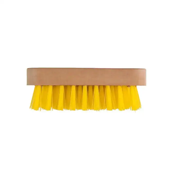 Yellow scrub brush for cleaning and hygiene maintenance.