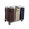 Cloth laundry carts on a mobile metal frame, used for transporting and sorting laundry in commercial and hospitality settings.