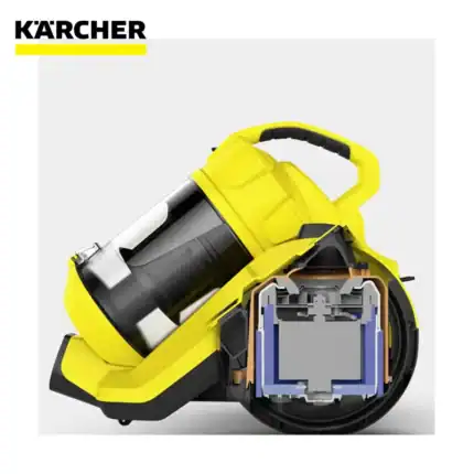 Kärcher industrial vacuum cleaner, yellow and black, with internal components visible, emphasizing powerful cleaning performance and durability for commercial use.