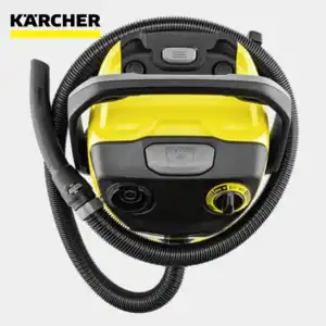 Karcher yellow and black wet dry vacuum cleaner with hose and adjustable dial for industrial cleaning.