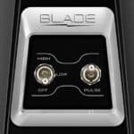 Blade tattoo machine control panel showing power and pulse settings for professional tattooing equipment.