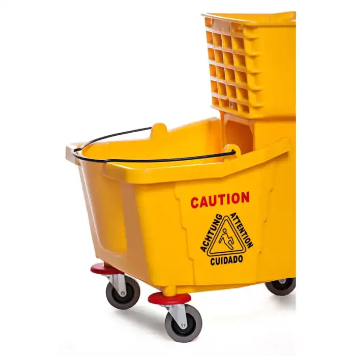 Wet floor caution mop bucket with warning sign for cleaning safety in commercial janitorial services.