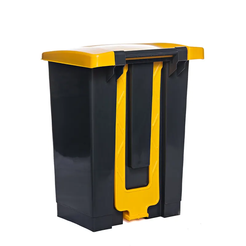 200601+UNIVERSAL+-+Trash+Bin-6 Hard plastic, outdoor multi-purpose trash bin with yellow lid and black body for waste disposal and sanitation solutions.