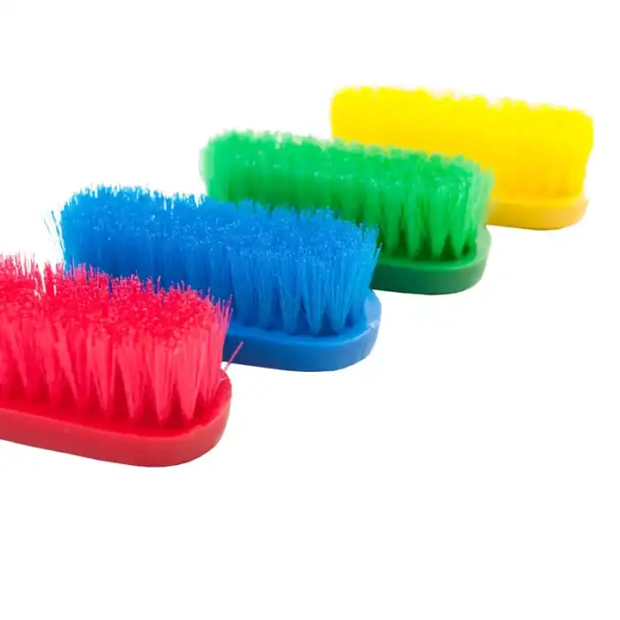 Blue, red, green, yellow scrub brushes for cleaning - colorful hygiene tools for effective sanitization and hygiene maintenance in Asia - Beyond Hygiene Asia.