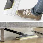 Disinfecting a sofa with a professional steam cleaner in a commercial or workplace environment.