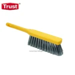 Scrubbing brush with yellow handle and black bristles for cleaning surfaces, ideal for commercial janitorial and hygiene tasks in Asia.