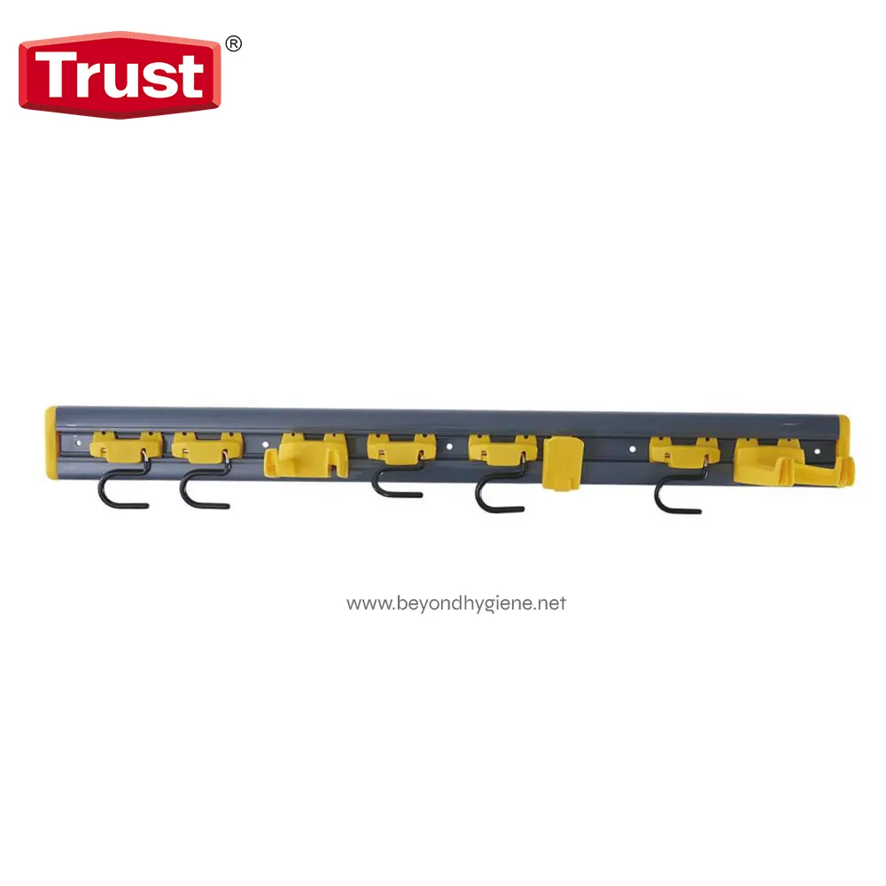 Image of a wall-mounted safety hook rack with multiple hooks and yellow clip holders, ideal for organizing tools or equipment in industrial and commercial settings, branded “Trust” for hygiene and safety purposes.