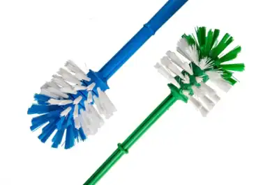 Blue and green cleaning brushes with durable plastic handles for hygiene maintenance and sanitation.