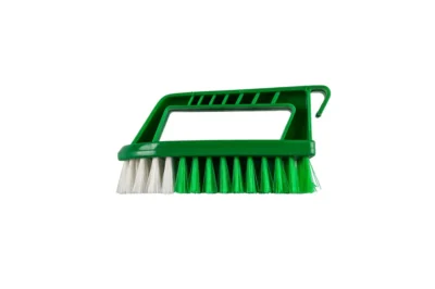 Green handheld scrub brush for cleaning surfaces, ideal for commercial hygiene and sanitation routines.