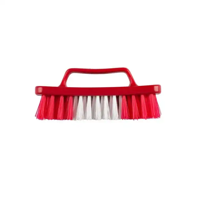 Red scrub brush for cleaning and hygiene sanitation.