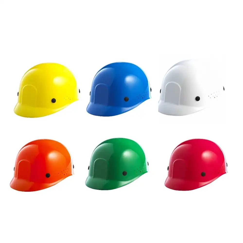 BLUE EAGLE BP65 BUMP CAP Yellow, blue, white, orange, green, and red safety helmets for industrial or construction use, emphasizing safety and protective gear.