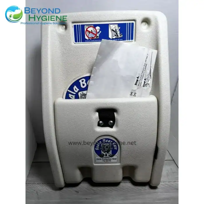 Kiddie child protection seat in a public restroom for safe bathroom use by children, featuring a durable plastic design with safety stickers, providing hygiene and safety for young children.