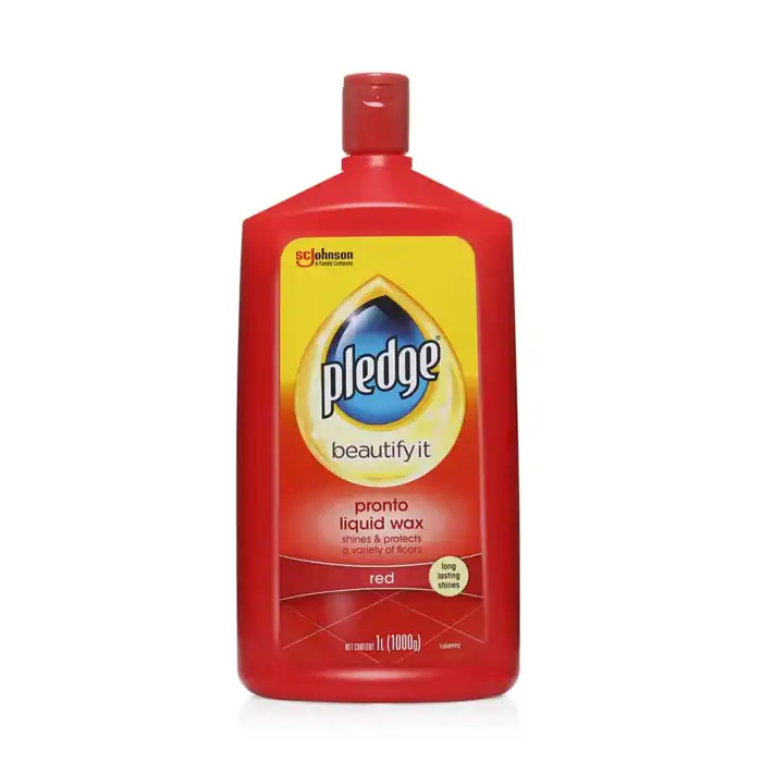 Shiny red liquid wax bottle for floor polishing, with Pledge branding, used for durable and long-lasting shine, ideal for home and commercial cleaning.
