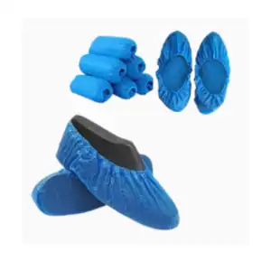 Blue disposable shoe covers and shoe covers for hygiene and safety, suitable for industries needing sterile environments.