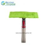 Microfiber cleaning mitt with adjustable handle for professional hygiene and sanitation. Designed for efficient cleaning in healthcare, hospitality, and commercial settings. Reusable and eco-friendly.