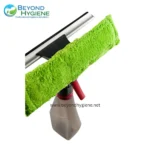 Microfiber cleaning pad on a window squeegee for professional hygiene cleaning services.