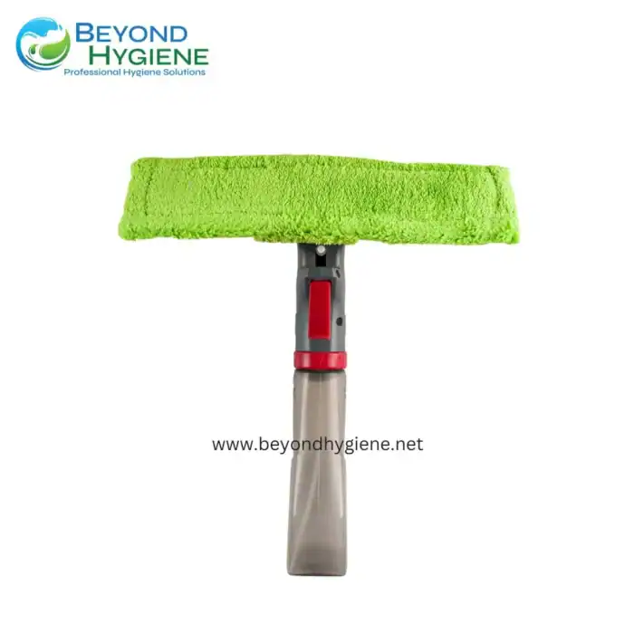 Microfiber cleaning mitt with adjustable handle for professional hygiene and sanitation. Designed for efficient cleaning in healthcare, hospitality, and commercial settings. Reusable and eco-friendly.