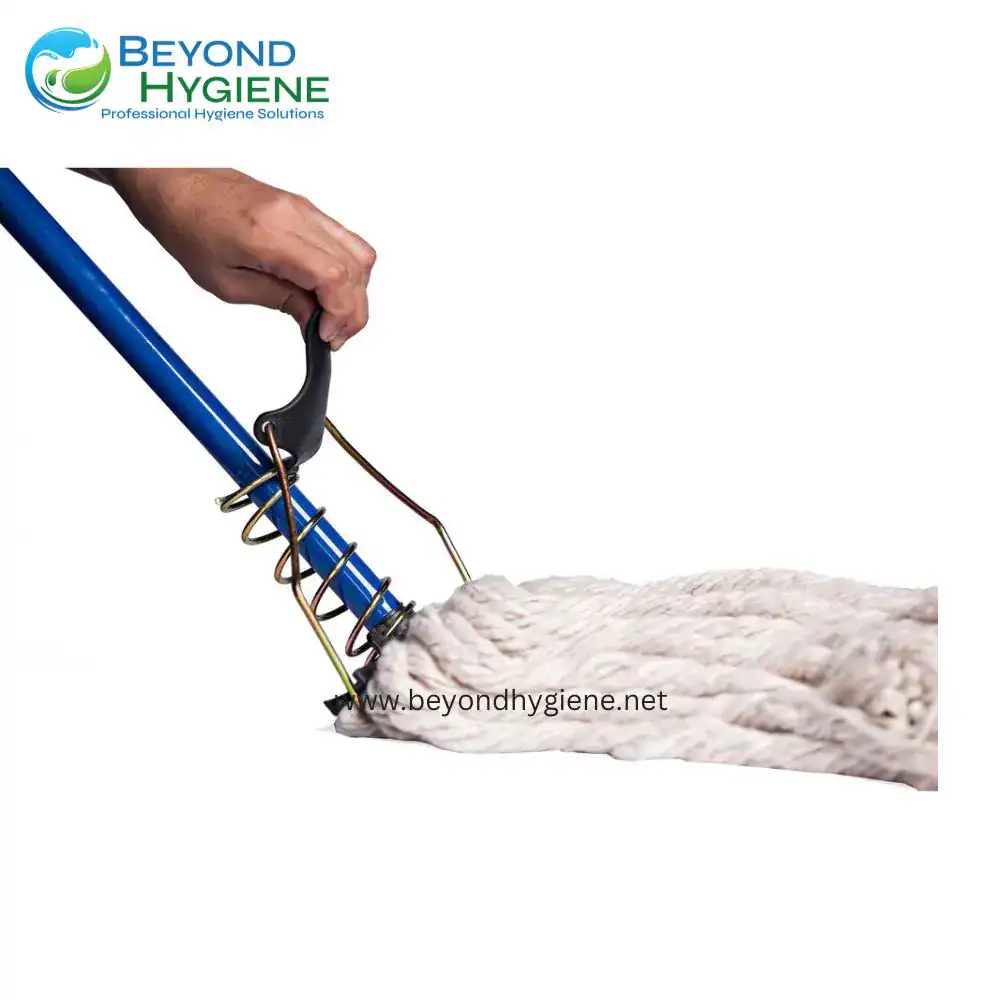 SPRING TYPE STEEL MOP SET (2) Hosing a large piece of raw meat with a steam cleaning device, emphasizing hygiene solutions for food processing industries at Beyond Hygiene Asia.