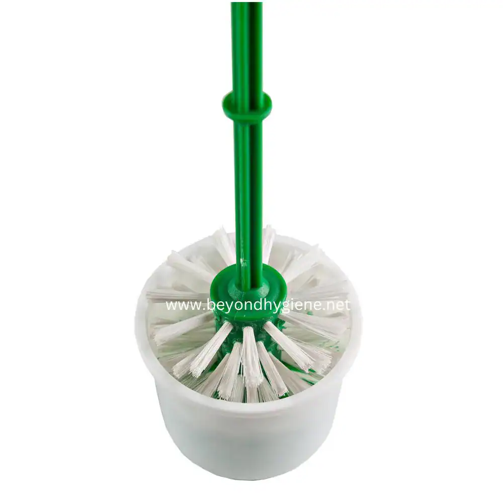 TOILET BRUSH (#800) (2) Disposable toilet brush cleaning tool with white bristles and green handle for hygiene maintenance in Asian bathrooms.