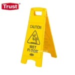 Caution wet floor sign for slip hazard safety warning, bright yellow with black text and icon.