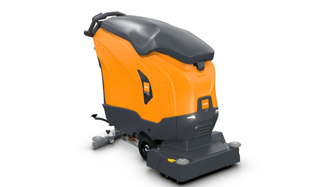 Heavy-duty industrial floor cleaning machine in orange and black, designed for commercial use to maintain hygiene standards in large public spaces.