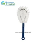 Brush cleaning tool with white bristles, used for hygiene maintenance and cleaning.