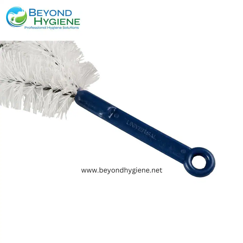 UTILITY BRUSH (#889) (3) Gray and white cleaning brush with a blue handle for hygiene cleaning tasks.