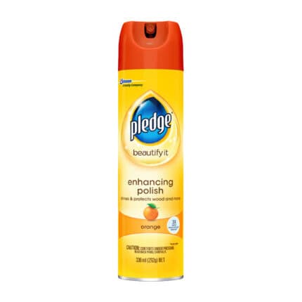 Pledge Orange Enhancing Polish spray with orange scent, designed to shine and protect wood surfaces, ideal for home and commercial cleaning.
