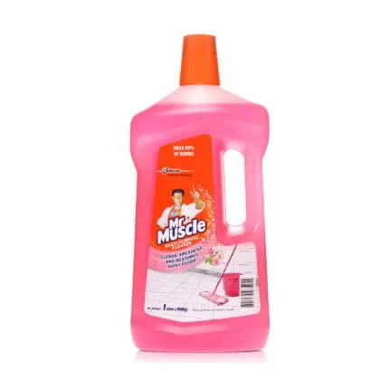 Gentle pink Mr. Muscle multi-purpose cleaner bottle for kitchen and bathroom cleaning, kills 99% germs, restores shiny floors, and freshens surfaces. Perfect for hygiene and sanitation needs.