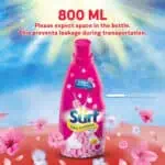 Surf fabric conditioner bottle with pink blossoms and colorful background, emphasis on hygiene and fabric care, suitable for Beyond Hygiene Asia SEO keywords, laundry, fabric softeners, floral scent, long-lasting freshness.