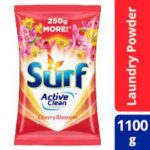 Bright pink laundry detergent pouch with cherry blossom design, emphasizing 1100g size and active cleanliness for ultimate fabric freshness.