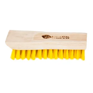 Black scrub brush with yellow bristles for industrial cleaning and hygiene maintenance.