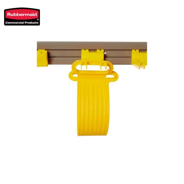 Yellow rubber glove hook for wall mounting in commercial cleaning facilities.