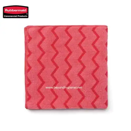 Soft pink cleaning cloth with red zigzag pattern, ideal for janitorial and commercial cleaning tasks.