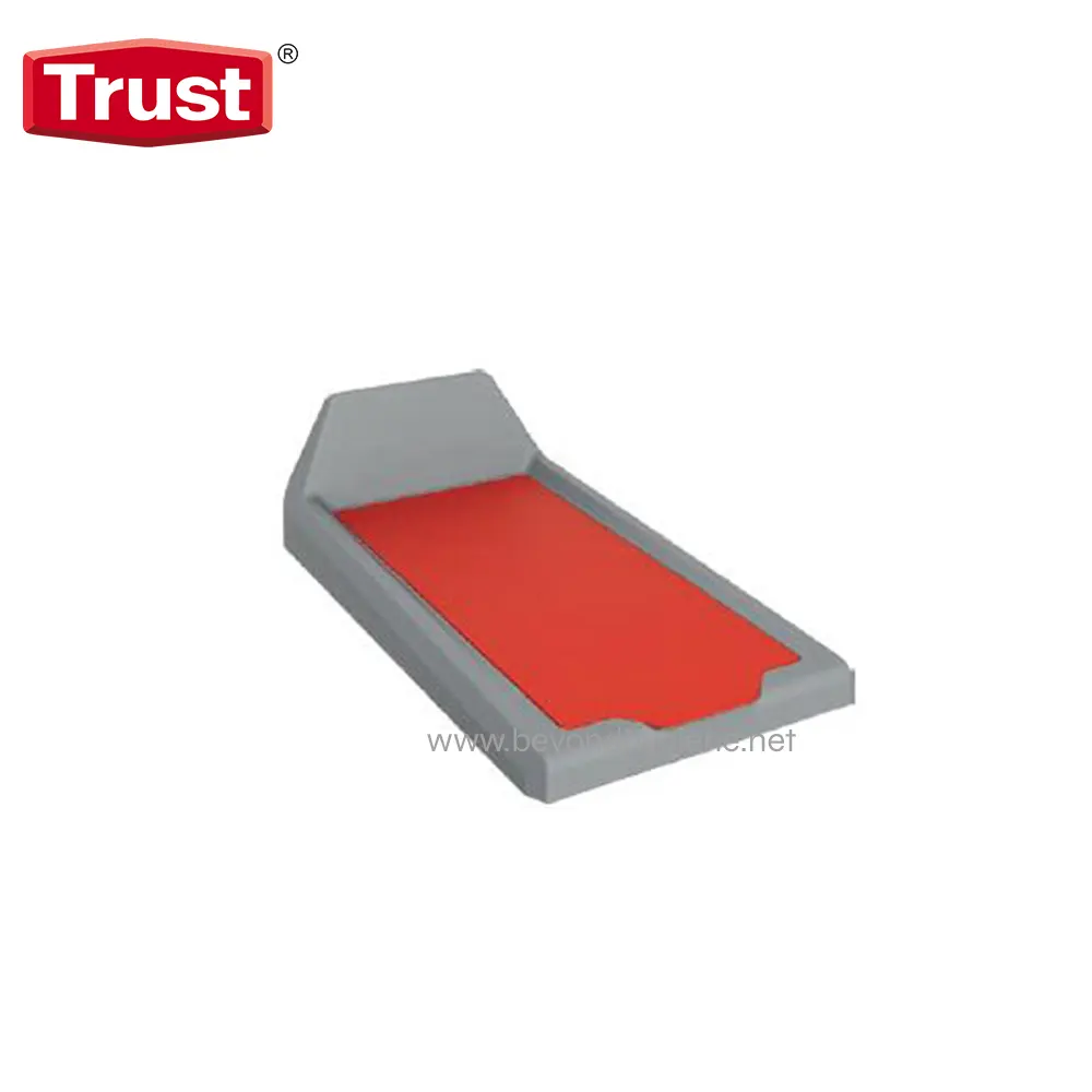 Anti-slip red mat on gray base for hygiene and safety.