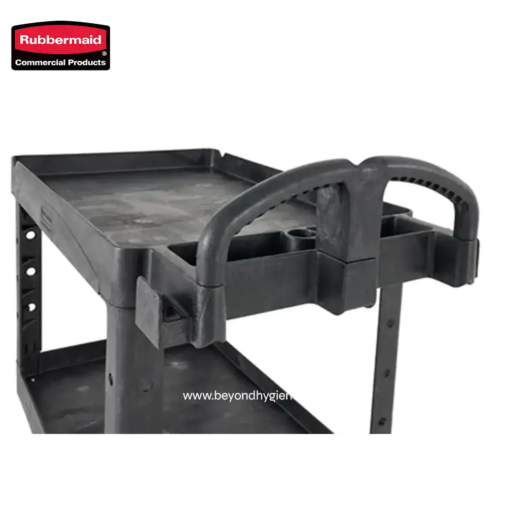 2 Rubbermaid cleaning cart with durable plastic surfaces, multiple compartments, and ergonomic handle, ideal for commercial hygiene and sanitation needs.
