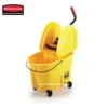 Rubbermaid yellow mop bucket with wringer and wheels for commercial cleaning.