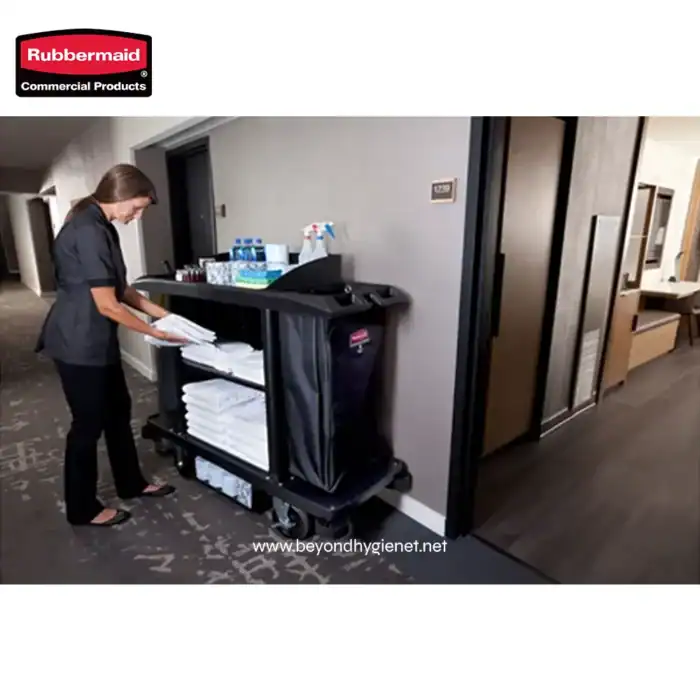 Disinfection supplies and cleaning cart in hotel corridor for hygiene and sanitation services.