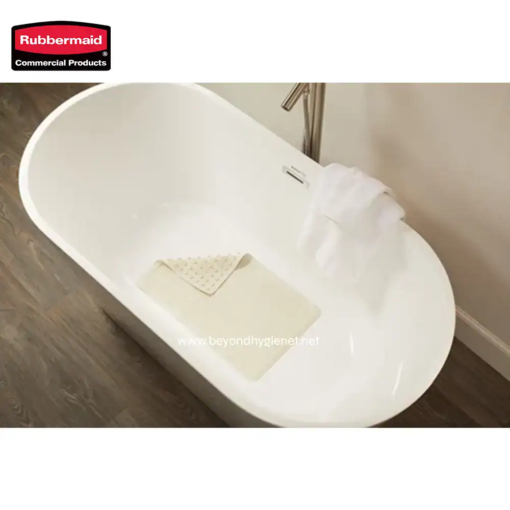 3 Microbial bath tub for hygiene cleaning, white freestanding bathtub with towel and cleaning mat, modern bathroom hygiene equipment at Beyond Hygiene Asia.