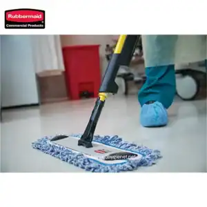Rubbermaid toilet brush with holder for bathroom cleaning and hygiene maintenance.