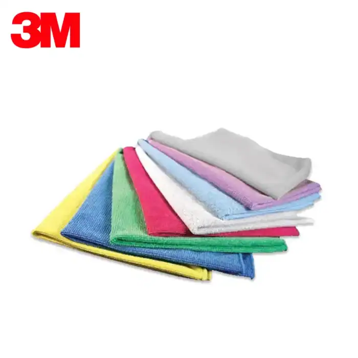 Disposable cleaning cloths in various colors, used for hygiene and sanitation purposes.