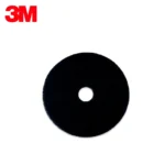 Black foam polishing disc for industrial cleaning and surface finishing used in various industries.