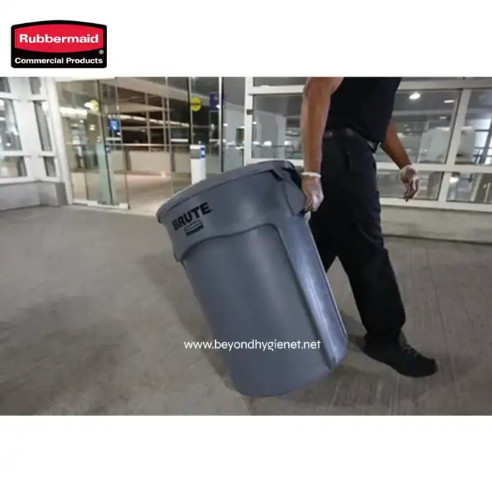 Commercial trash bin for waste disposal at airport or public space, durable and hygienic for sanitation needs.