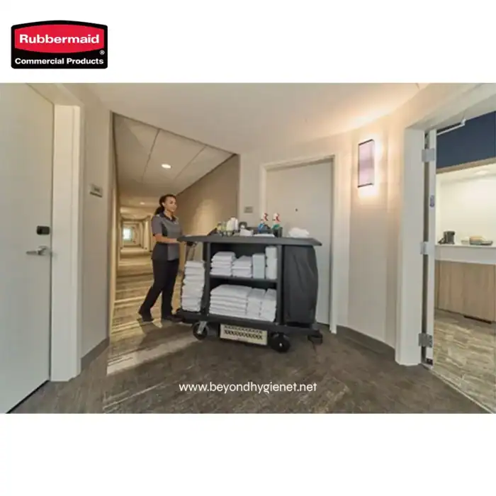 Cleaning supplies cart with towels and disinfectants in hotel corridor, janitorial service, hygiene equipment in hospitality industry, Beyond Hygiene Asia.